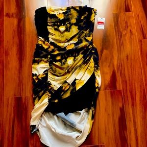 Tube strapless dress.  Hi and low in the back.